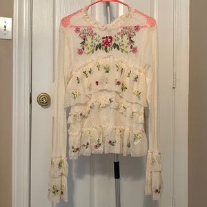 Jella Couture lace floral top.